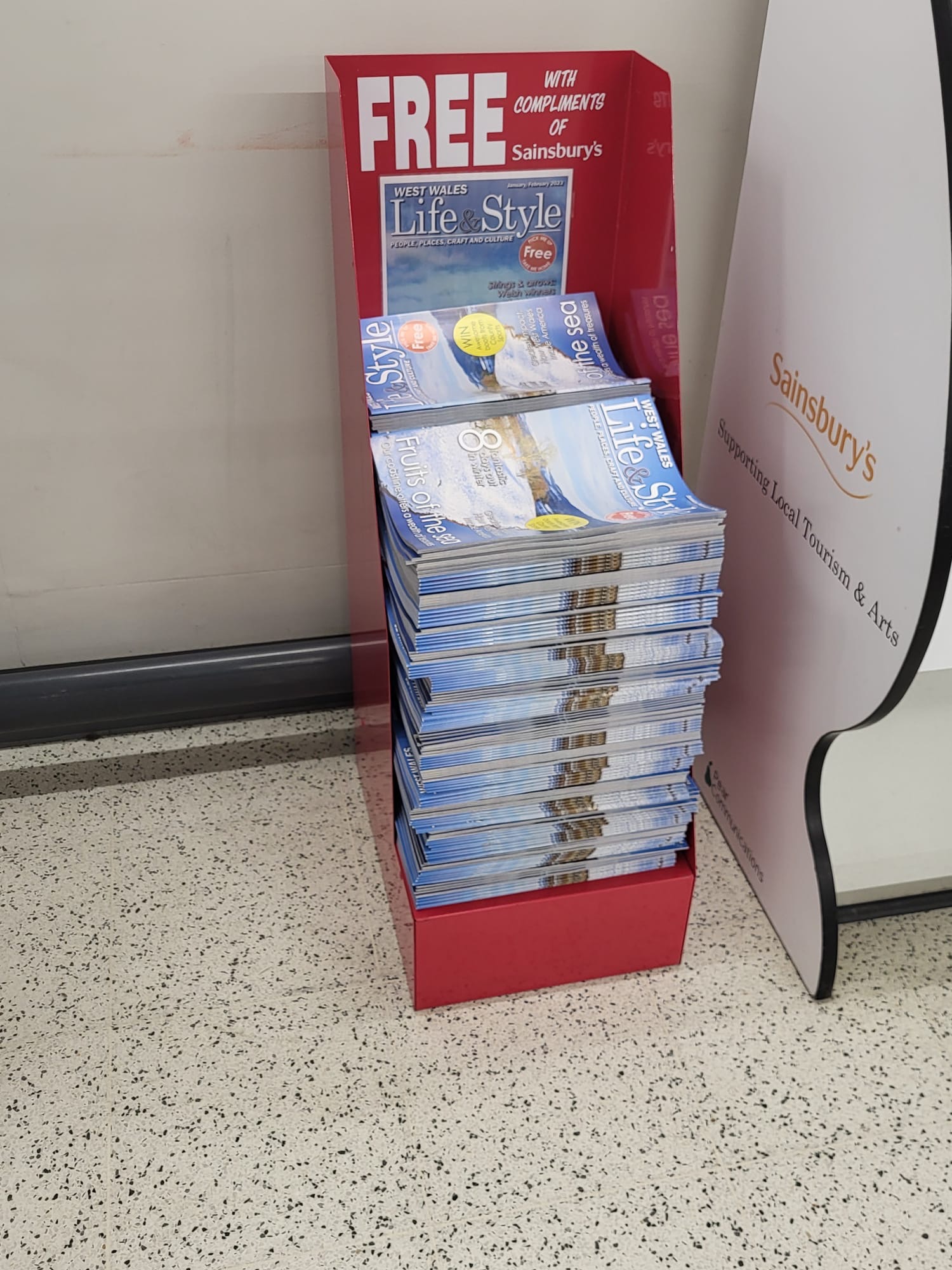 West Wales Life and Style magazines on a branded Sainsbury's stand